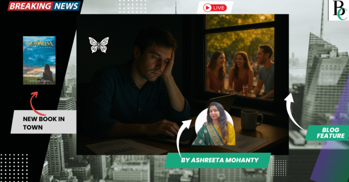A tired young man sits at a desk on a Saturday evening, lit only by his laptop screen